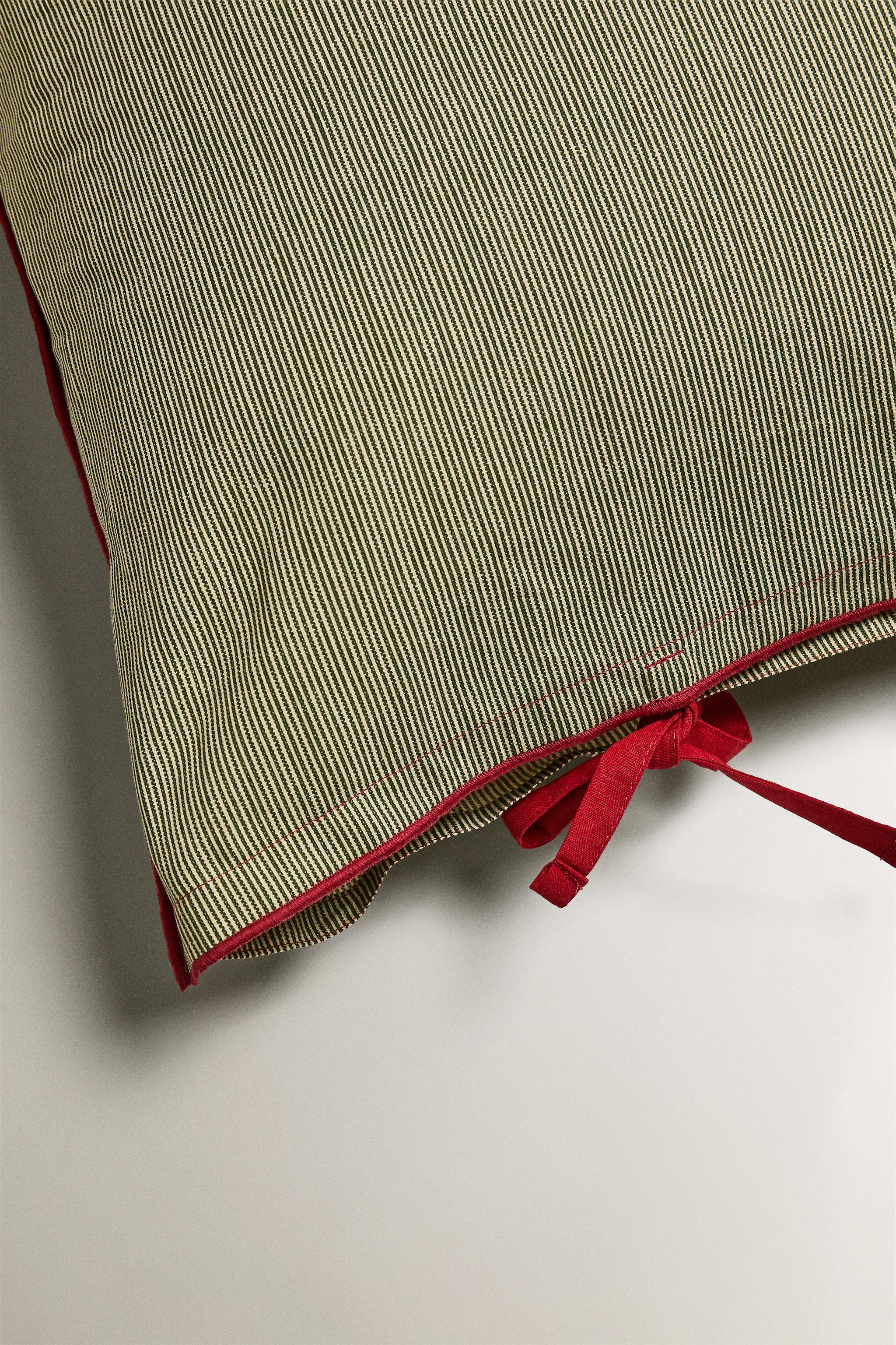 TAIE D’OREILLER RAYURES OVERLOCK